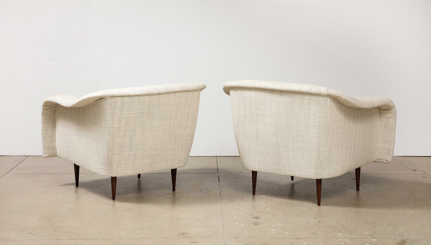 Pair of Curved Lounge Chairs by Joaquim Tenreiro